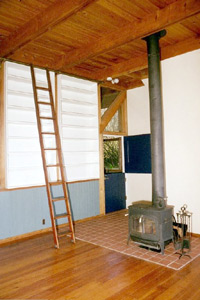 Wall to wall book shelves and sliding library ladder made from British Honduras mahogany